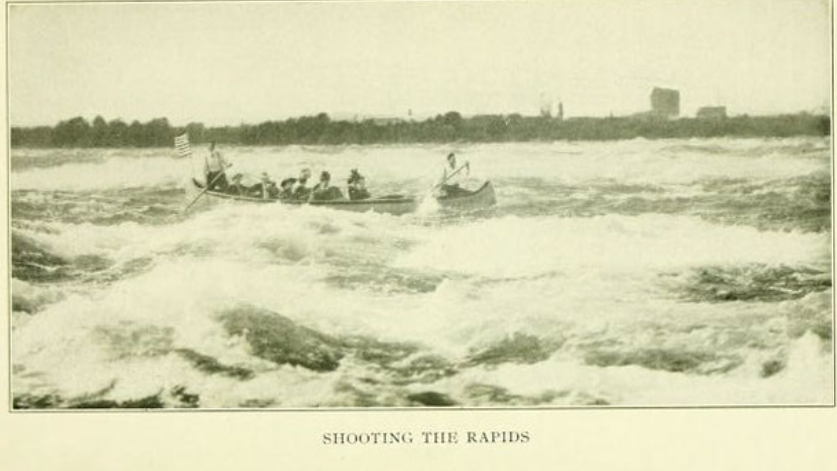 shooting the rapids by canoe