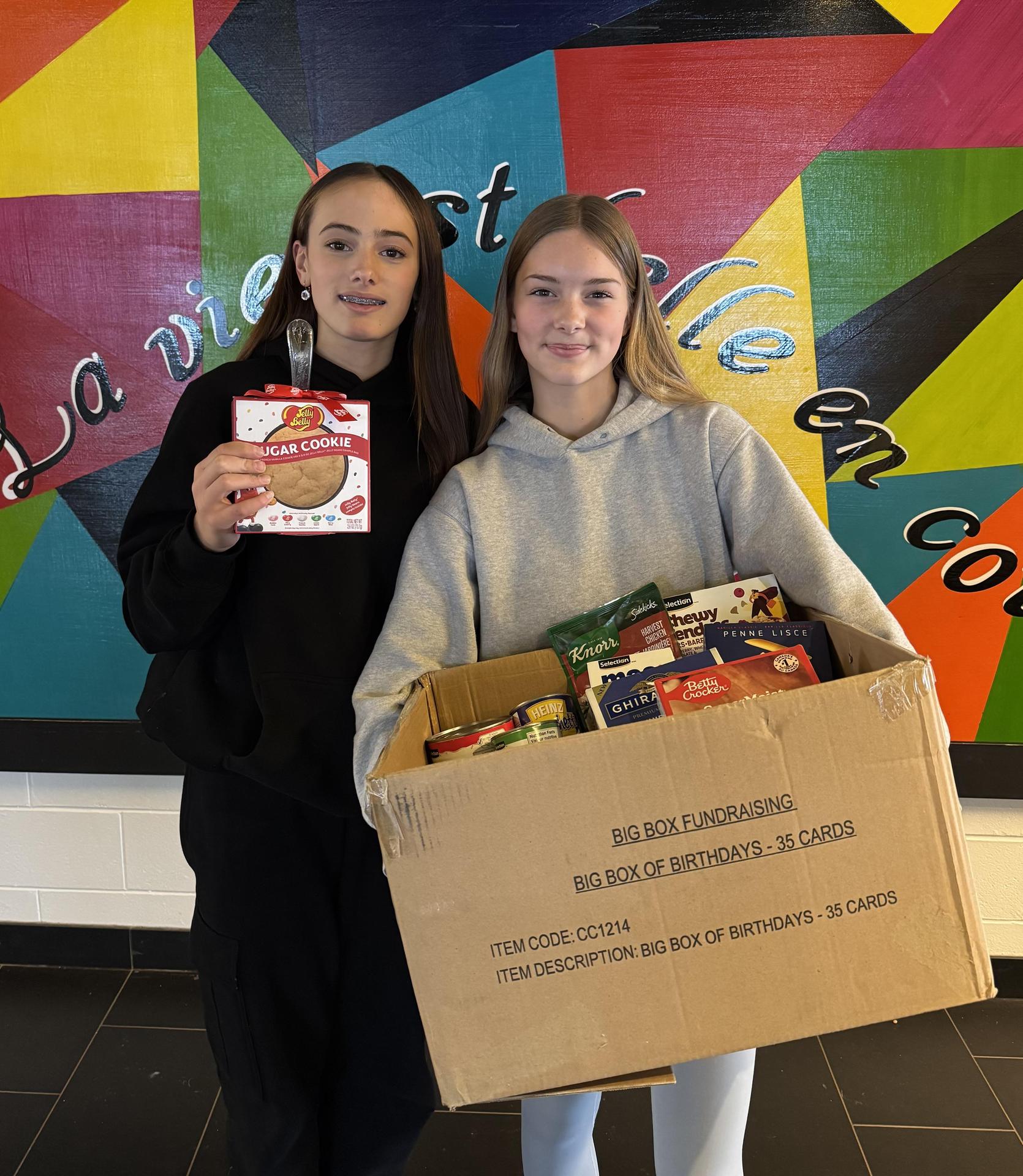students collect canned items at FH Clergue